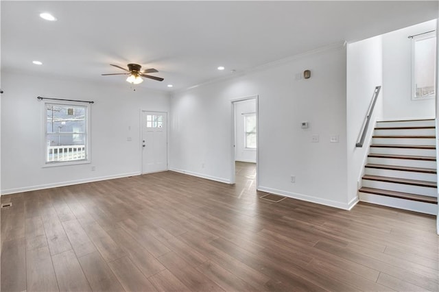 unfurnished living room with recessed lighting, stairway, dark wood-type flooring, ceiling fan, and baseboards