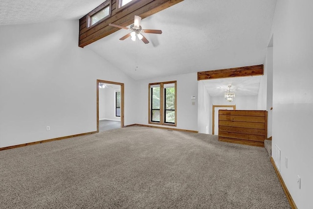 unfurnished living room with a ceiling fan, carpet, baseboards, and a textured ceiling