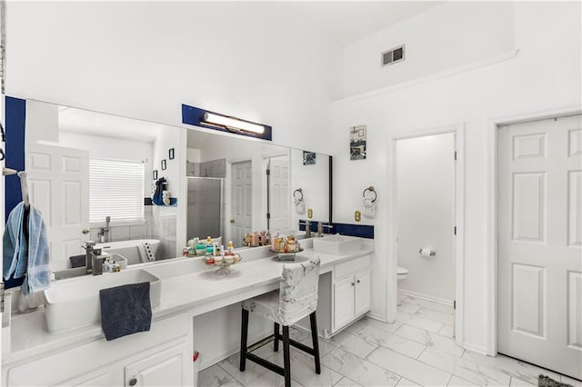 full bathroom with visible vents, toilet, marble finish floor, and a shower stall