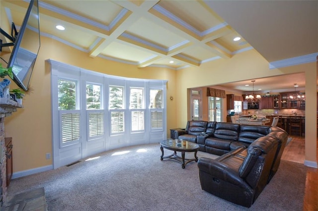3423 Mulberry Lane Ct, Dacula, GA 30019 - carpeted living room with a chandelier, beamed ceiling, coffered ceiling, ornamental molding, and recessed lighting
