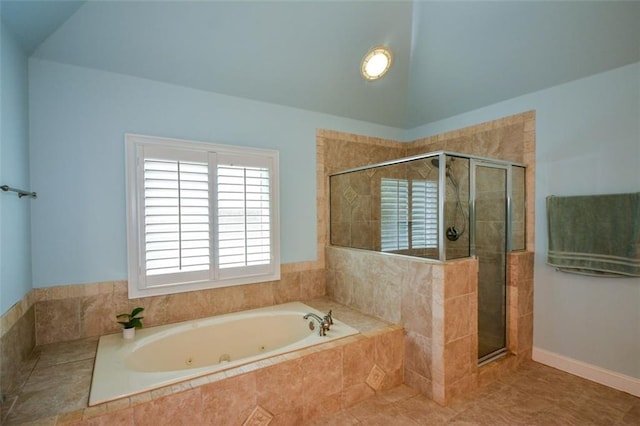 3423 Mulberry Lane Ct, Dacula, GA 30019 - bathroom featuring a whirlpool tub, a stall shower, and vaulted ceiling