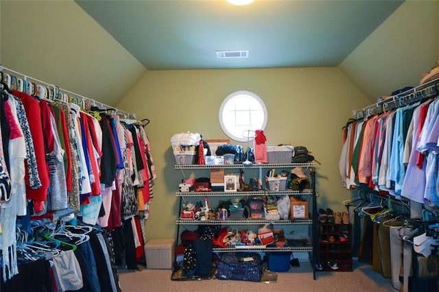 3423 Mulberry Lane Ct, Dacula, GA 30019 - walk in closet featuring vaulted ceiling and carpet flooring