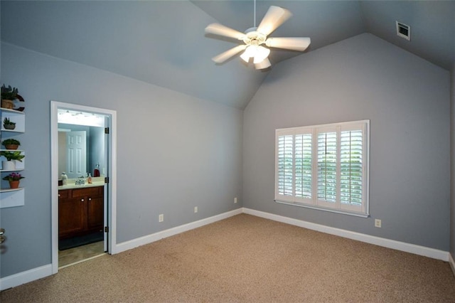 3423 Mulberry Lane Ct, Dacula, GA 30019 - unfurnished bedroom featuring light carpet, lofted ceiling, ensuite bathroom, and a ceiling fan