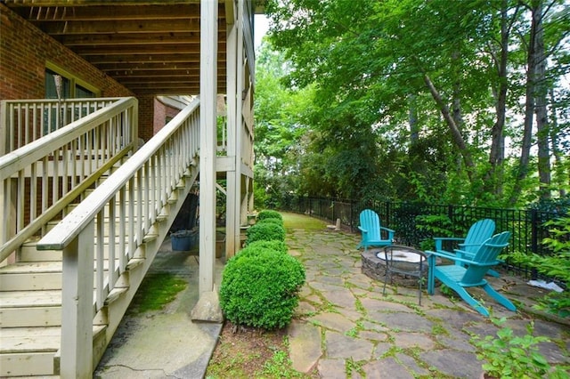 3423 Mulberry Lane Ct, Dacula, GA 30019 - view of yard with stairway, an outdoor fire pit, a patio area, and a wooden deck