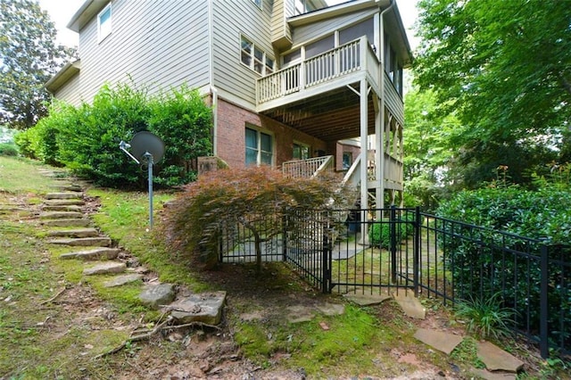 3423 Mulberry Lane Ct, Dacula, GA 30019 - view of home's exterior with stairway and brick siding