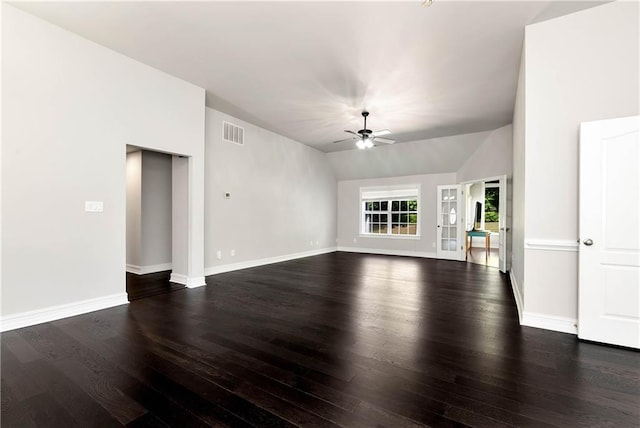 unfurnished living room with a ceiling fan, wood finished floors, vaulted ceiling, and baseboards