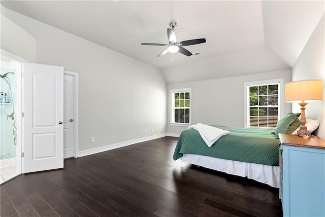 bedroom featuring wood finished floors, lofted ceiling, baseboards, and ceiling fan