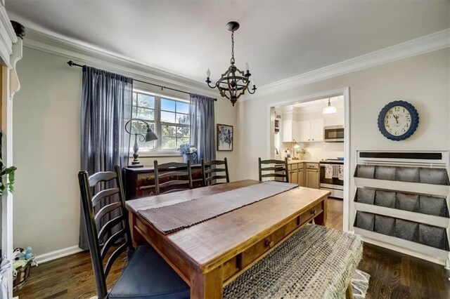 dining room with crown molding, dark hardwood / wood-style floors, and a notable chandelier