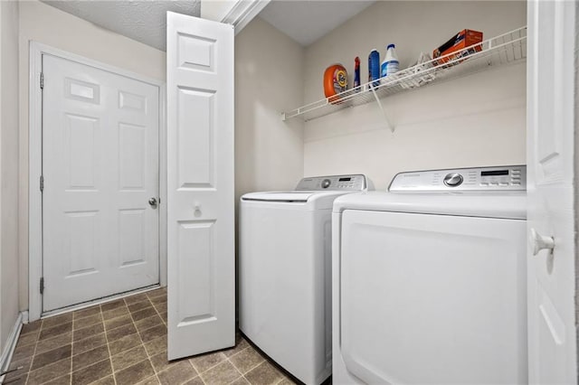 laundry room featuring laundry area and washer and dryer