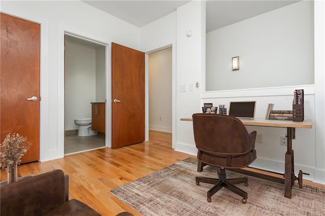home office featuring wood finished floors