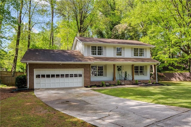 3719 Northbrook Ct, Atlanta, GA 30340 - view of front of home featuring an attached garage, concrete driveway, brick siding, and a porch