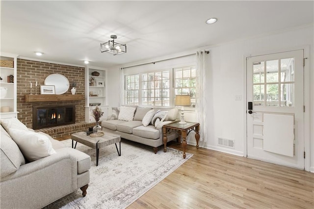 3719 Northbrook Ct, Atlanta, GA 30340 - living area featuring healthy amount of natural light, built in features, light wood-style floors, recessed lighting, and baseboards