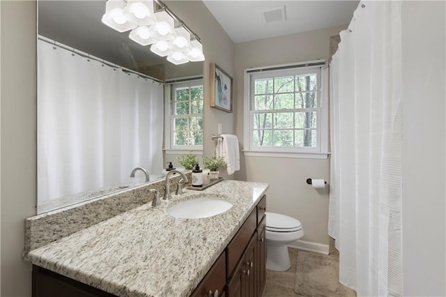 3719 Northbrook Ct, Atlanta, GA 30340 - bathroom featuring vanity, toilet, baseboards, and curtained shower