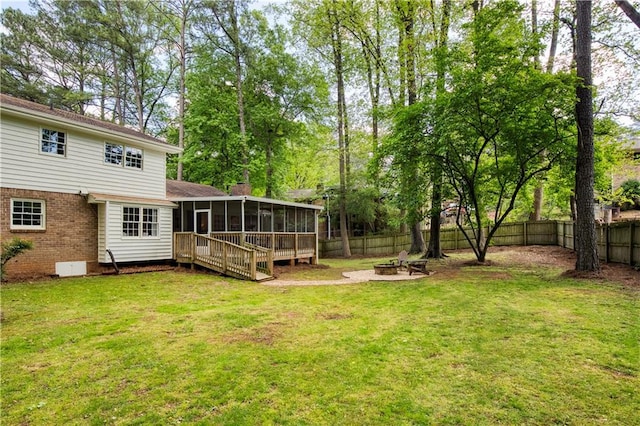 3719 Northbrook Ct, Atlanta, GA 30340 - view of yard with a sunroom and an outdoor fire pit