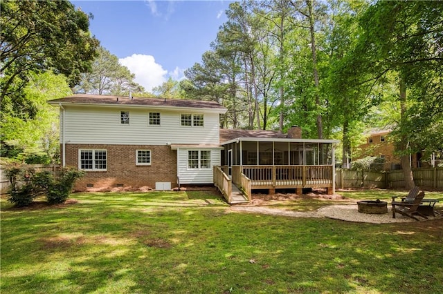 3719 Northbrook Ct, Atlanta, GA 30340 - back of property with a fire pit, a sunroom, brick siding, crawl space, and a chimney