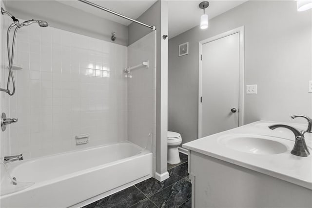 full bath with vanity, shower / tub combination, and toilet