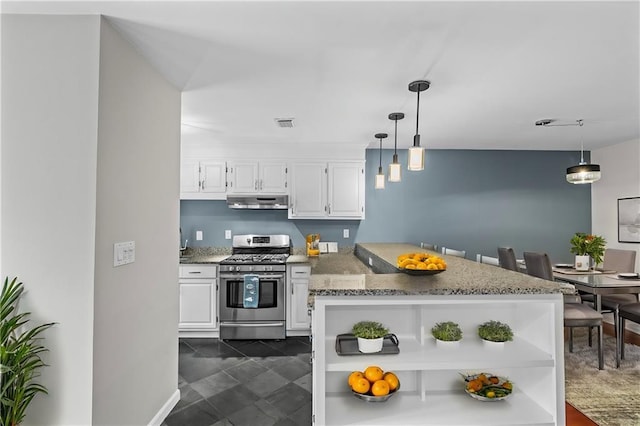 kitchen with white cabinets, light stone countertops, under cabinet range hood, open shelves, and stainless steel range with gas stovetop