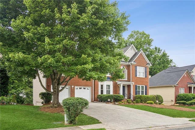 130 White Sands Ct, Suwanee, GA 30024 - view of front of home featuring brick siding, concrete driveway, and a front yard