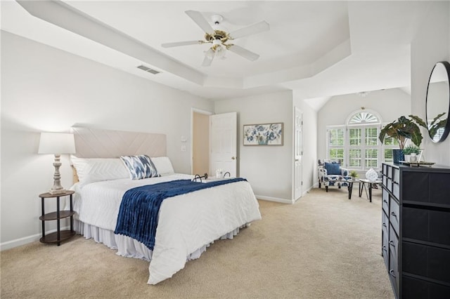 130 White Sands Ct, Suwanee, GA 30024 - bedroom featuring light carpet, a tray ceiling, and ceiling fan