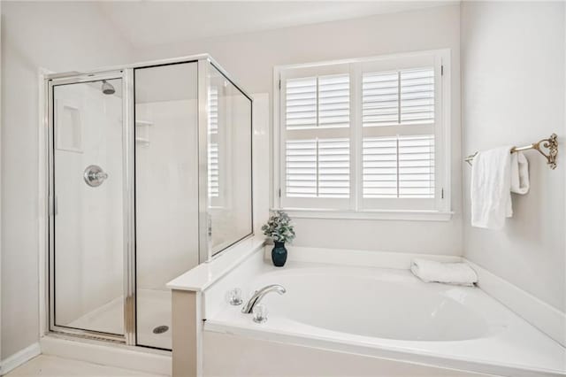 130 White Sands Ct, Suwanee, GA 30024 - full bathroom featuring a garden tub and a shower stall