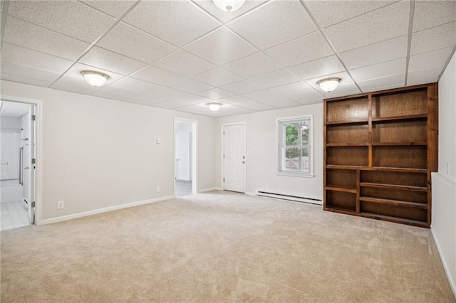 130 White Sands Ct, Suwanee, GA 30024 - unfurnished living room featuring a paneled ceiling, carpet, and baseboard heating