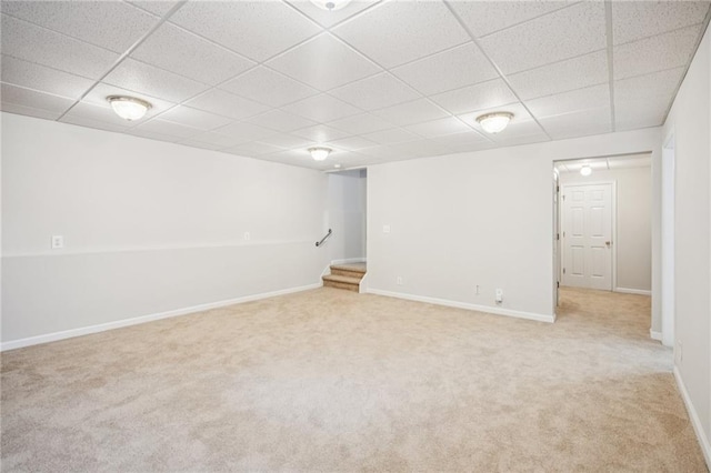 130 White Sands Ct, Suwanee, GA 30024 - finished below grade area featuring light colored carpet, a paneled ceiling, and stairs