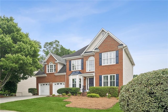 130 White Sands Ct, Suwanee, GA 30024 - view of front of home with driveway, brick siding, and a front yard