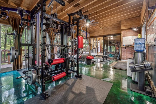 workout room featuring lofted ceiling