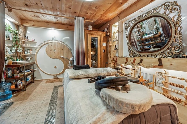 living area with tile patterned flooring and wood ceiling