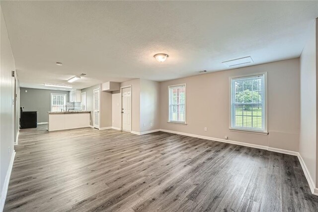 bedroom with light colored carpet, baseboards, a ceiling fan, and a closet
