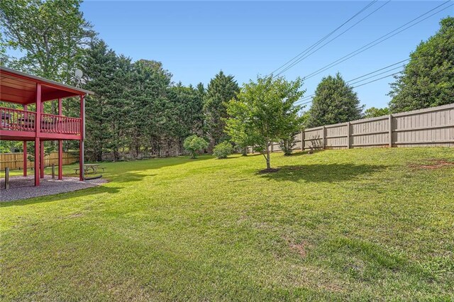 additional living space featuring ceiling fan, carpet flooring, baseboards, and vaulted ceiling