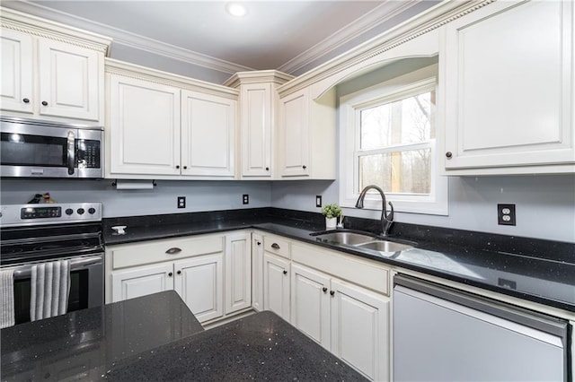 kitchen featuring crown molding, appliances with stainless steel finishes, sink, and dark stone countertops