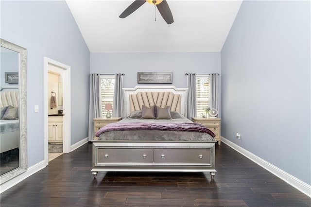 bedroom with lofted ceiling, dark hardwood / wood-style flooring, and multiple windows