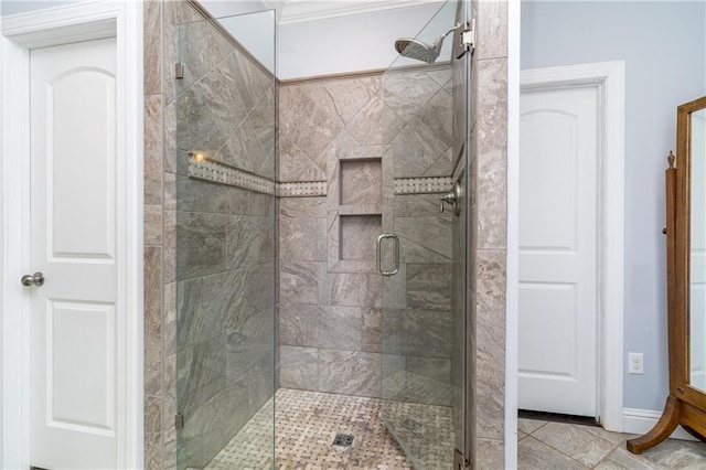 bathroom with a shower with shower door