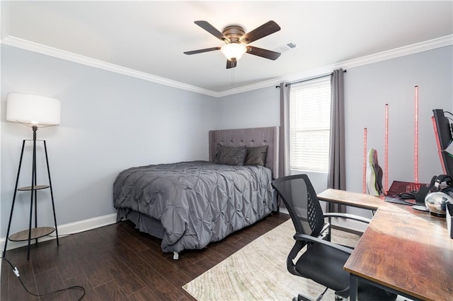 bedroom featuring ornamental molding, dark wood-type flooring, and ceiling fan