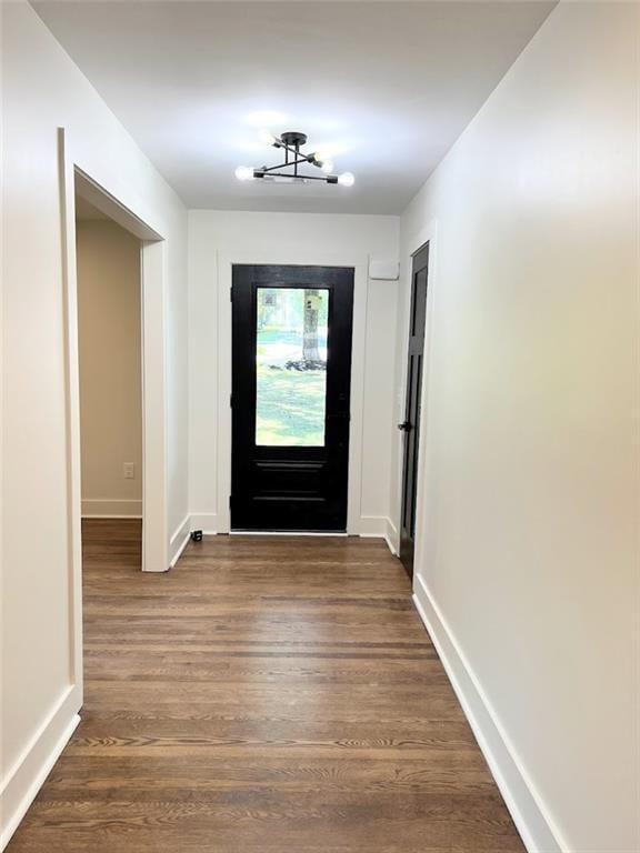 doorway featuring dark hardwood / wood-style flooring