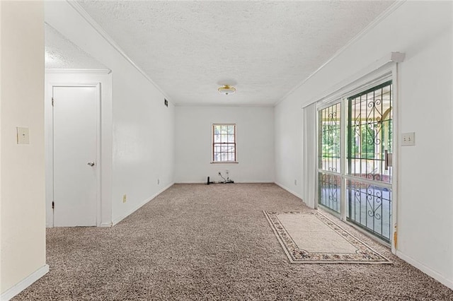 2117 Chestnut Hill Cir, Decatur, GA 30032 - carpeted empty room featuring a textured ceiling and crown molding