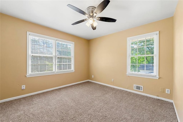 2117 Chestnut Hill Cir, Decatur, GA 30032 - empty room featuring carpet flooring and a ceiling fan