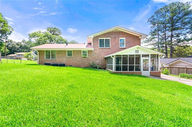 2117 Chestnut Hill Cir, Decatur, GA 30032 - back of house with a sunroom and brick siding