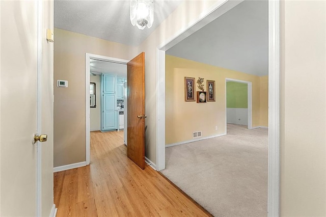 2117 Chestnut Hill Cir, Decatur, GA 30032 - hallway featuring baseboards and light wood-type flooring