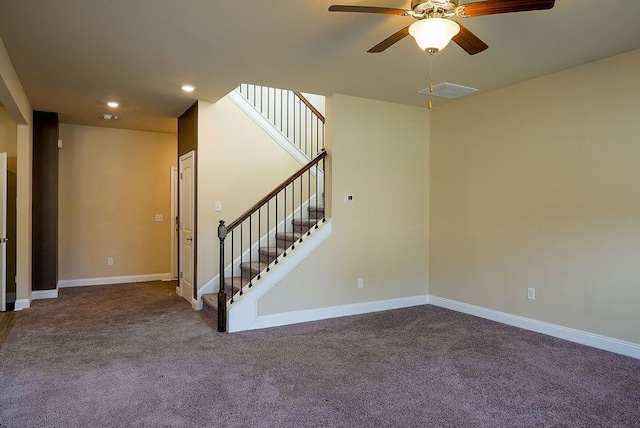 unfurnished room featuring stairway, carpet, and baseboards