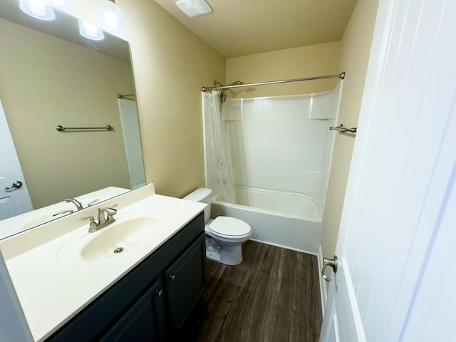 bathroom featuring visible vents, shower / bathtub combination with curtain, toilet, vanity, and wood finished floors