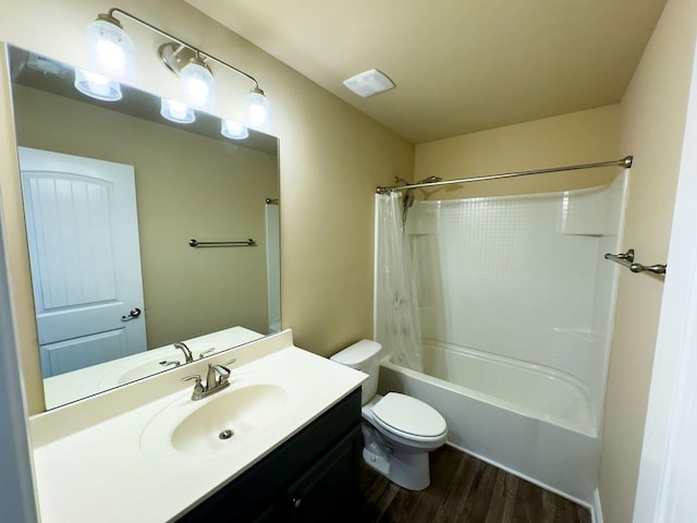 full bathroom with shower / bath combo, vanity, toilet, and wood finished floors