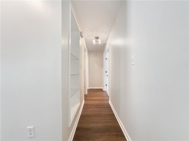89 Elsberry Rd, Dallas, GA 30157 - corridor featuring dark wood-type flooring, baseboards, and attic access