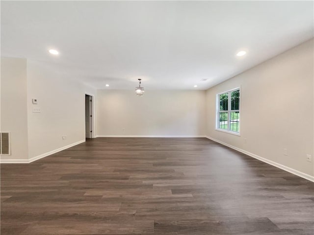 89 Elsberry Rd, Dallas, GA 30157 - unfurnished room featuring recessed lighting, baseboards, and dark wood finished floors