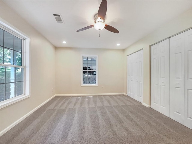 89 Elsberry Rd, Dallas, GA 30157 - unfurnished bedroom featuring two closets, carpet flooring, baseboards, recessed lighting, and a ceiling fan