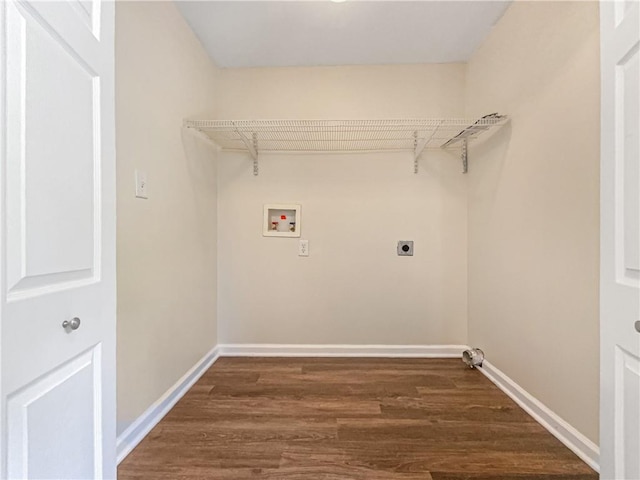 89 Elsberry Rd, Dallas, GA 30157 - laundry room with washer hookup, electric dryer hookup, dark wood-style flooring, and baseboards