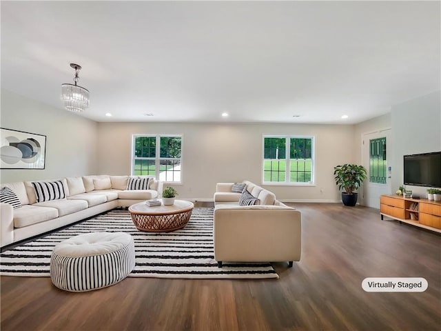 89 Elsberry Rd, Dallas, GA 30157 - living room featuring wood finished floors, healthy amount of natural light, a chandelier, recessed lighting, and baseboards