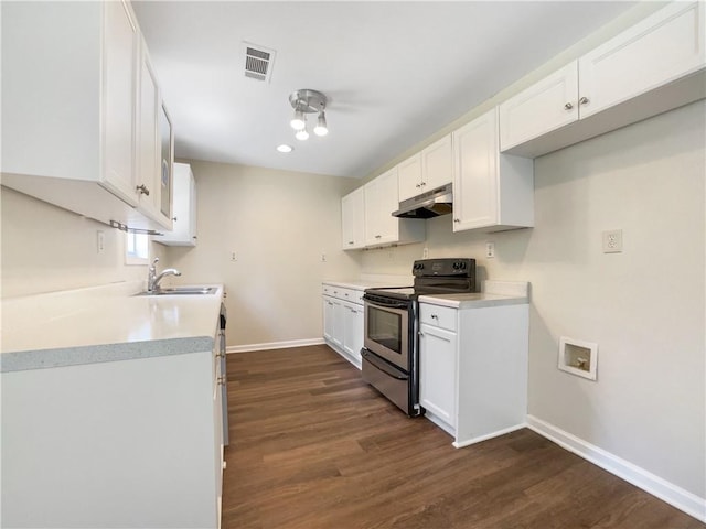 89 Elsberry Rd, Dallas, GA 30157 - kitchen featuring stainless steel electric range oven, under cabinet range hood, dark wood-type flooring, baseboards, and recessed lighting