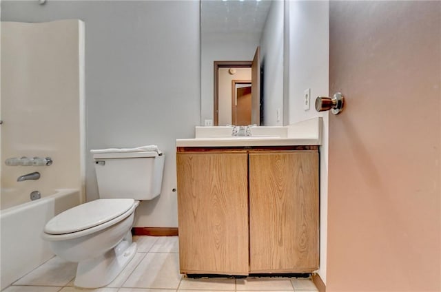 full bathroom with vanity, tile patterned flooring, toilet, and washtub / shower combination